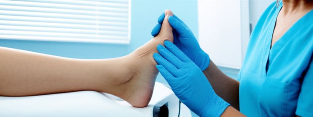 Close-up of feet showing bunion condition on big toe