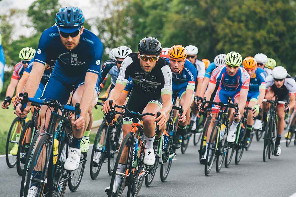 Cycling peloton racing on the road