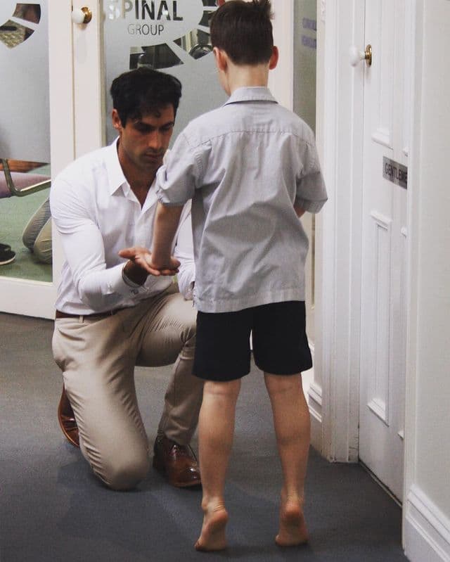 Dr Steven Singh treating a young patient at Melbourne Sports Podiatry