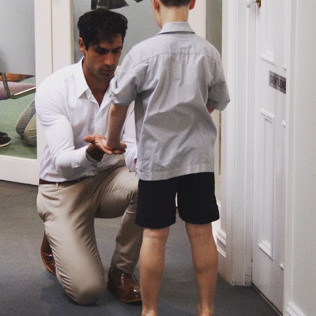 Steve Singh treating a young patient